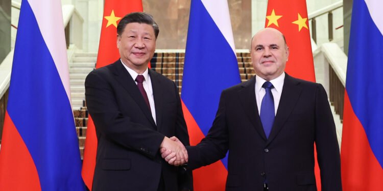 Chinese President Xi Jinping and Russian Prime Minister Mikhail Mishustin