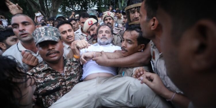Indian opposition leader Rahul Gandhi being detained by police during a sit-in protest outside Prime Minister Modi’s residence in New Delhi on Tuesday.